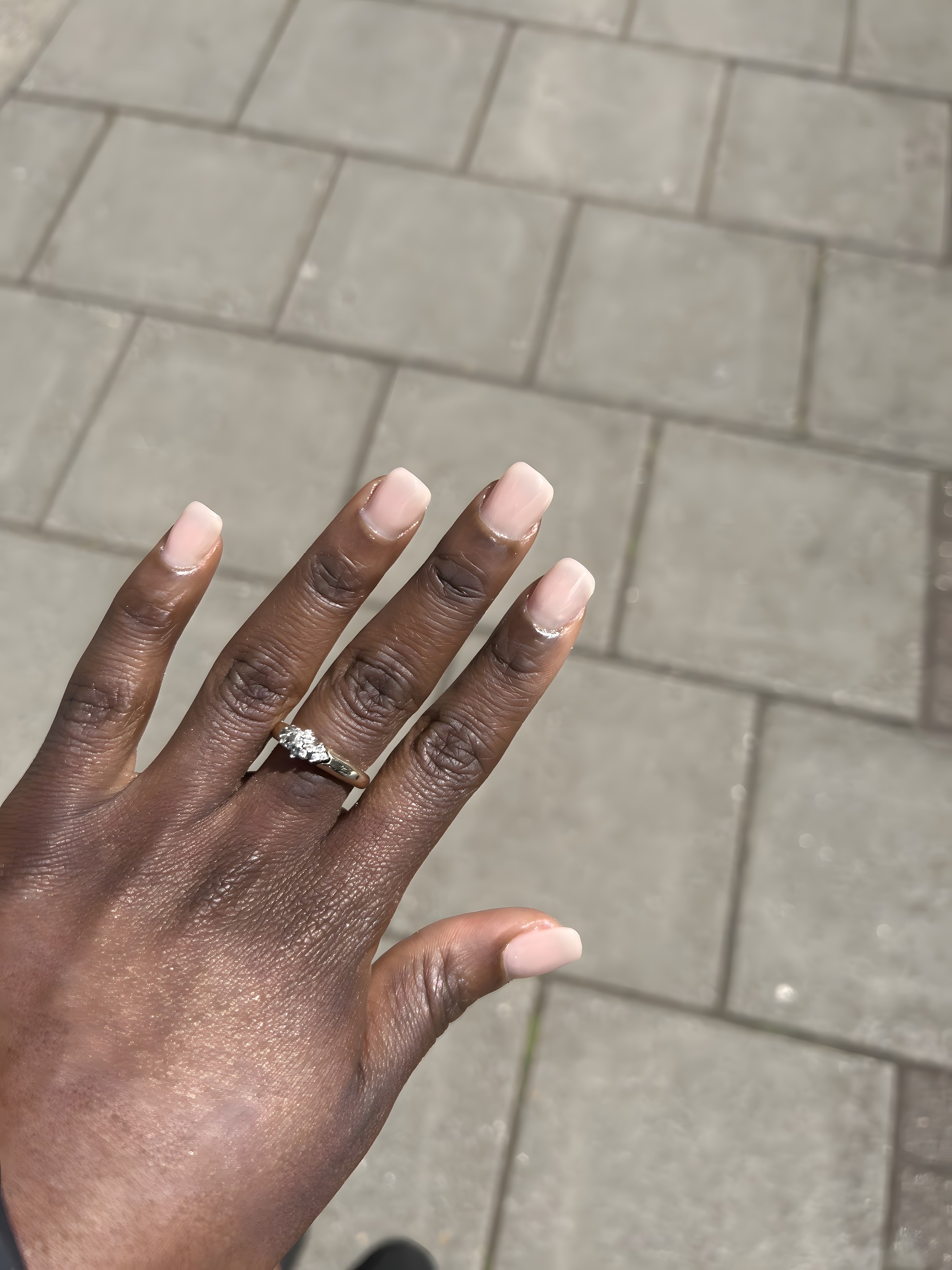 Soft natural almond nails with a subtle french design