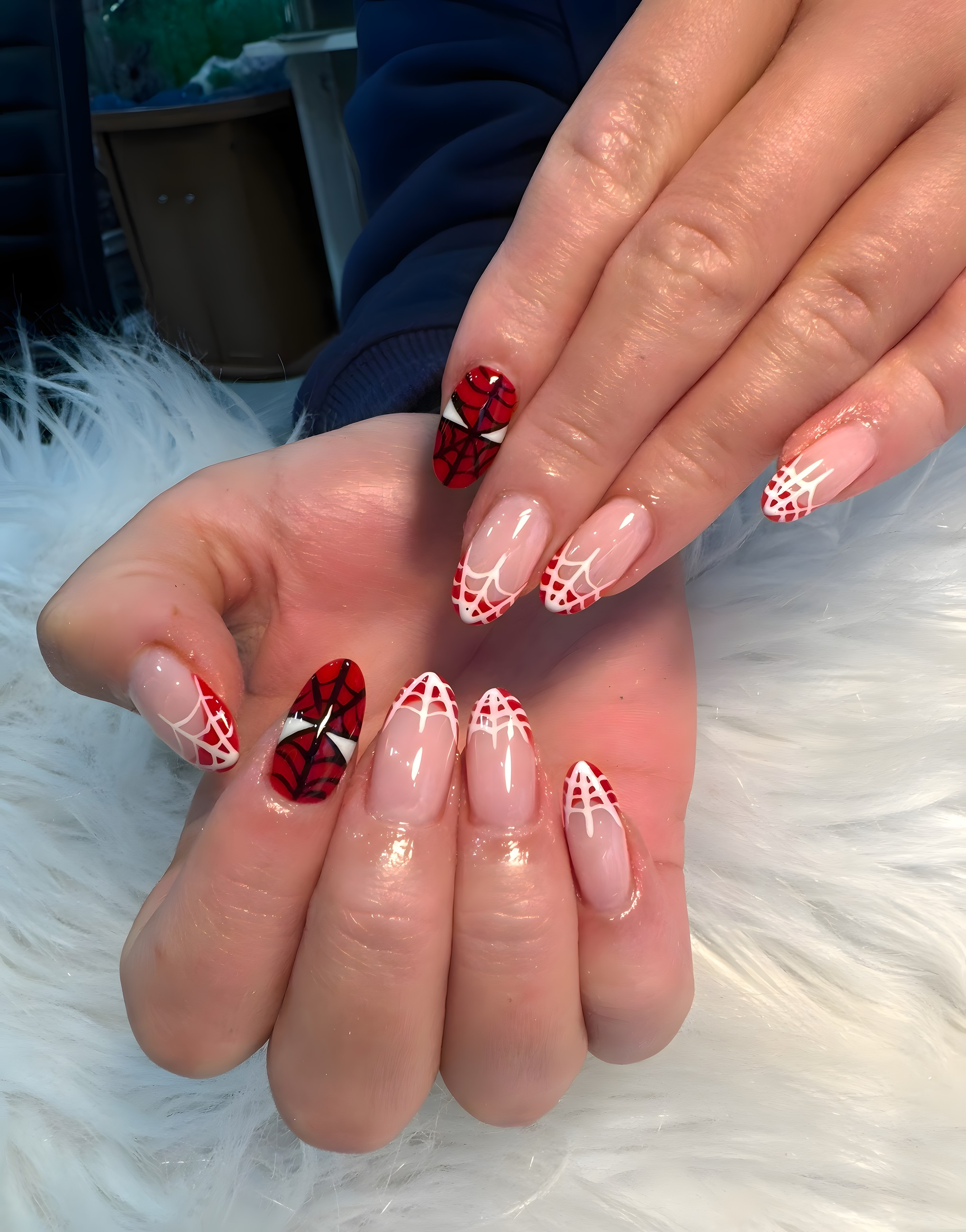 Red and white spiderweb themed nail art set